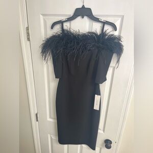 Calvin Klein Dress
Has a little stretch and never worn! New with tags